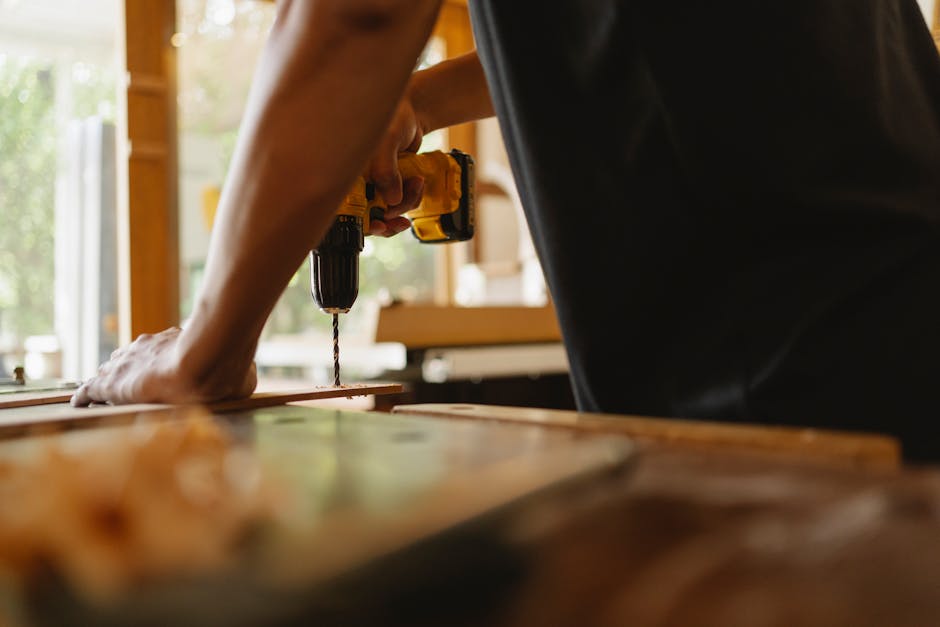 Carpenter precision-installing an interior door frame