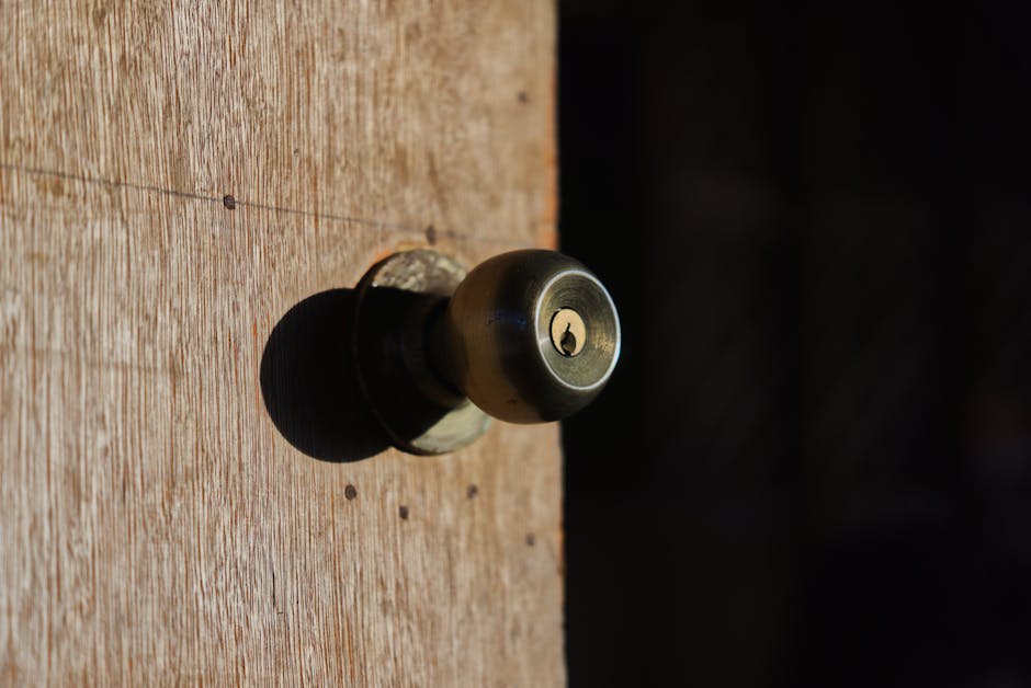 Close up of brass door knob on a newly installed fiberglass door